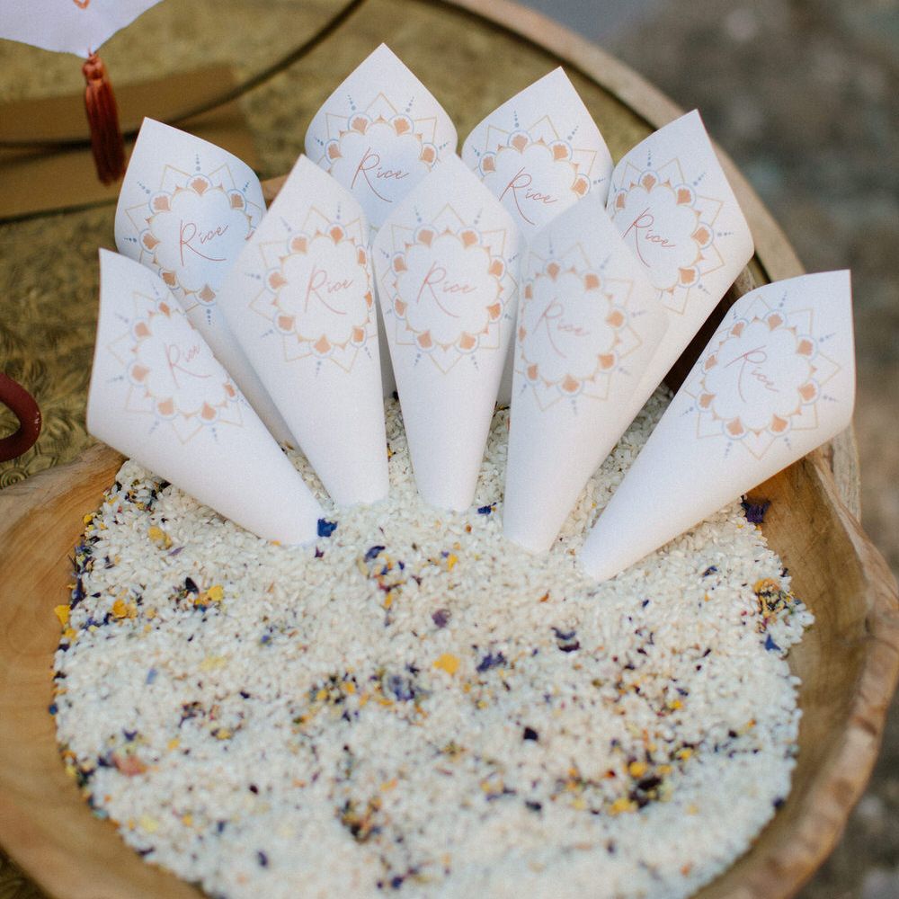 Confetti cones in a bowl of rice ready for the guests to take