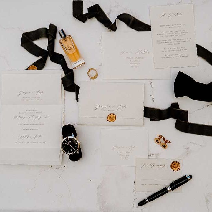 Classic wedding stationery suite and grooms accessories 