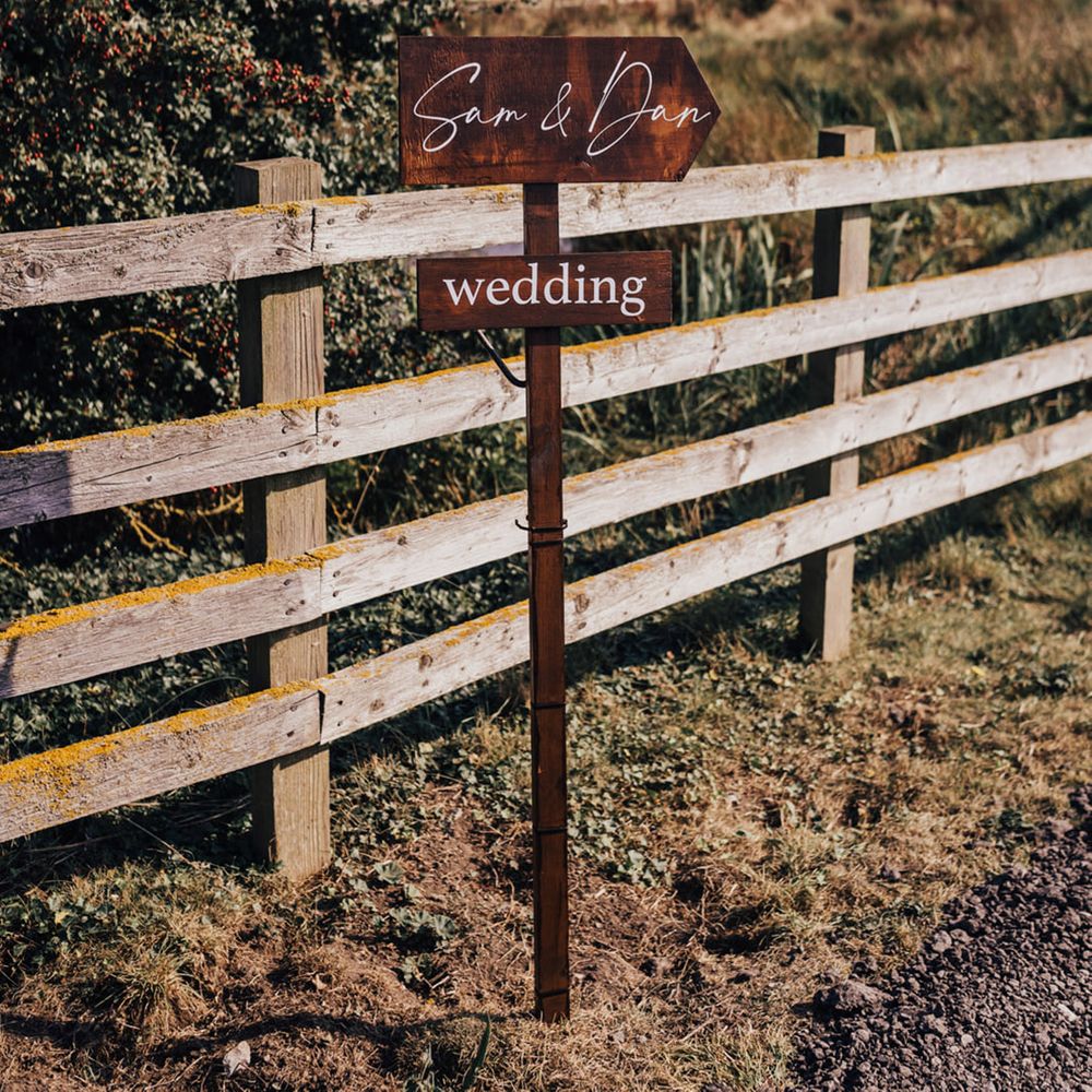 Wooden signs at Unplugged ceremony at Elmley Nature Reserve