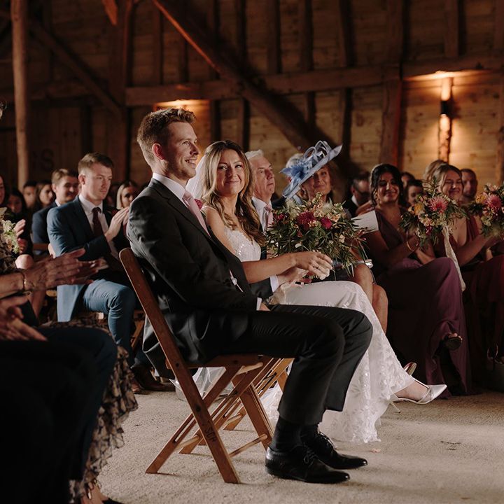 Bride and groom during rustic wedding ceremony at White Pond Farm