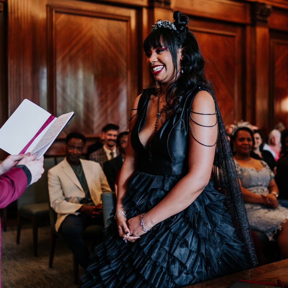 Bride wears her hair in space buns complete with skull bridal crown 