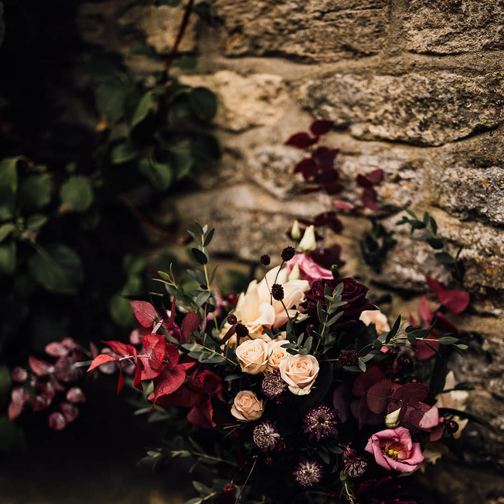 Pink, red and white bouquet of flowers with roses for the bride 