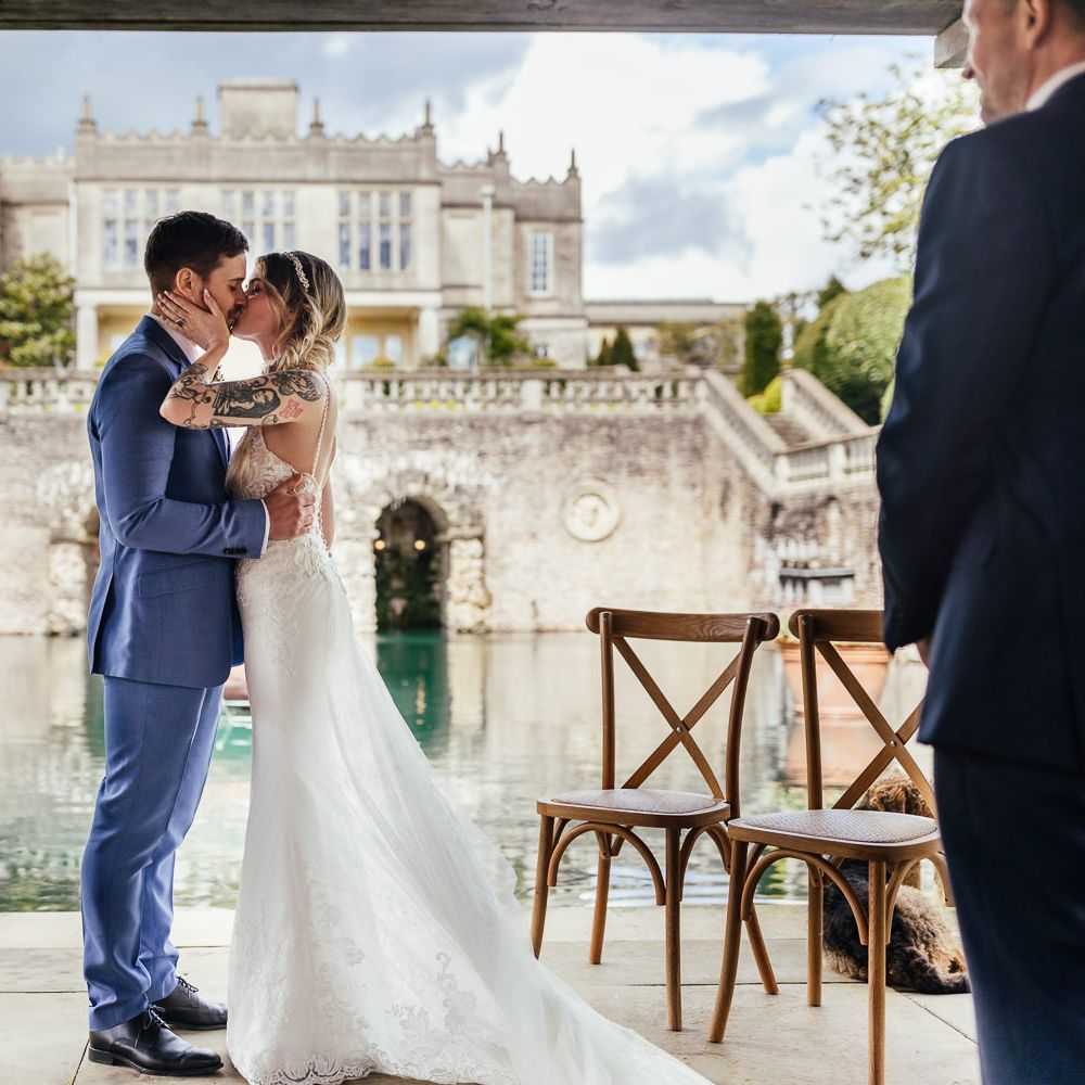 Bride & groom kiss at Euridge Manor on their wedding day