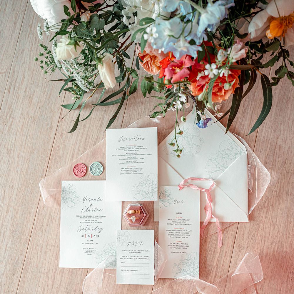 Wedding stationery suite with floral design and wax seals 