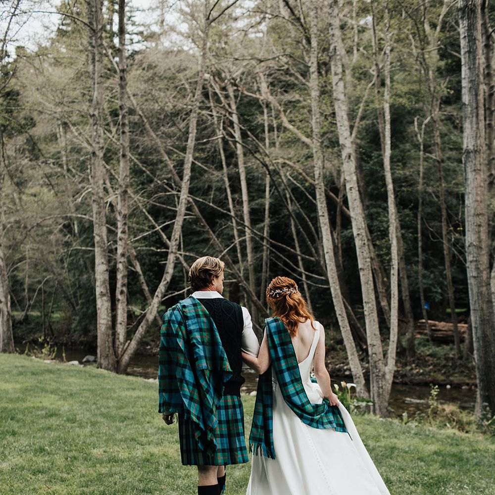 Scottish highland elopement in Big Sur with bride and groom wearing green and blue tartan 