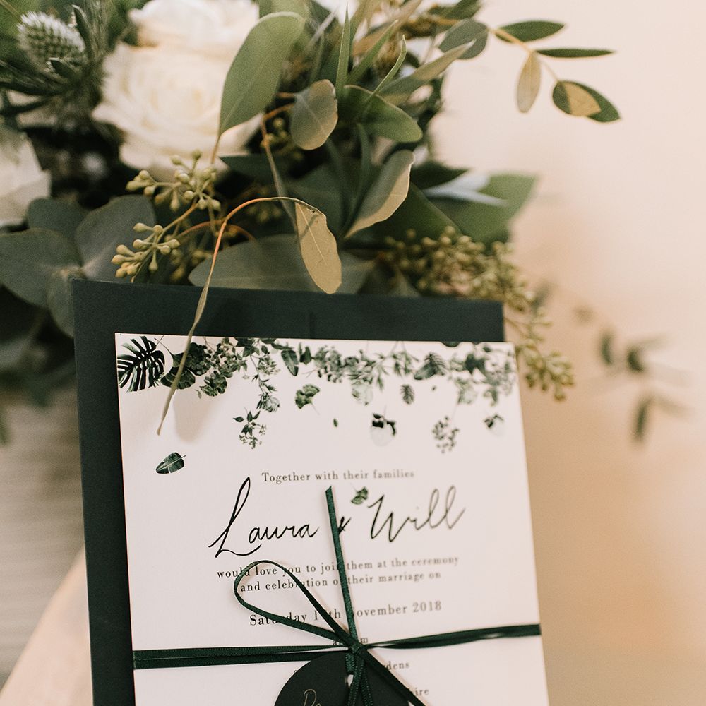 Green wedding invitation with green ribbon
