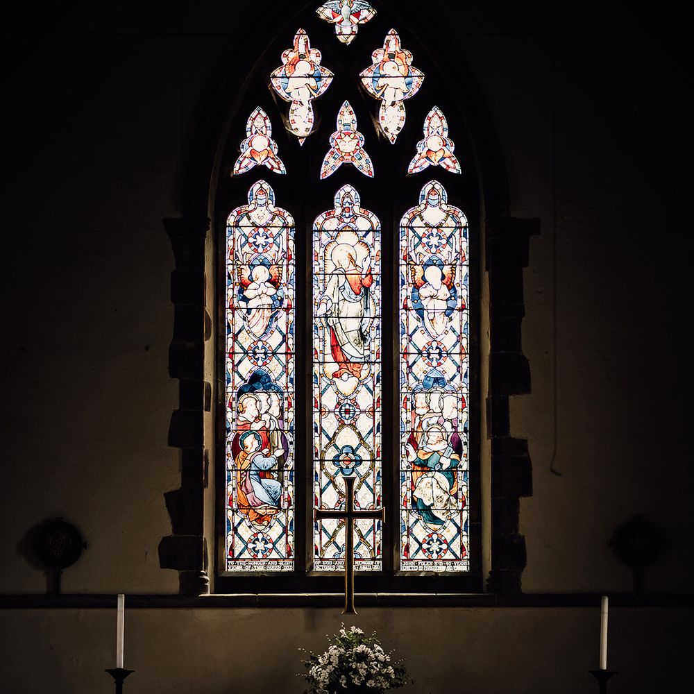 Altar of the church with stained glass windows for traditional wedding ceremony 