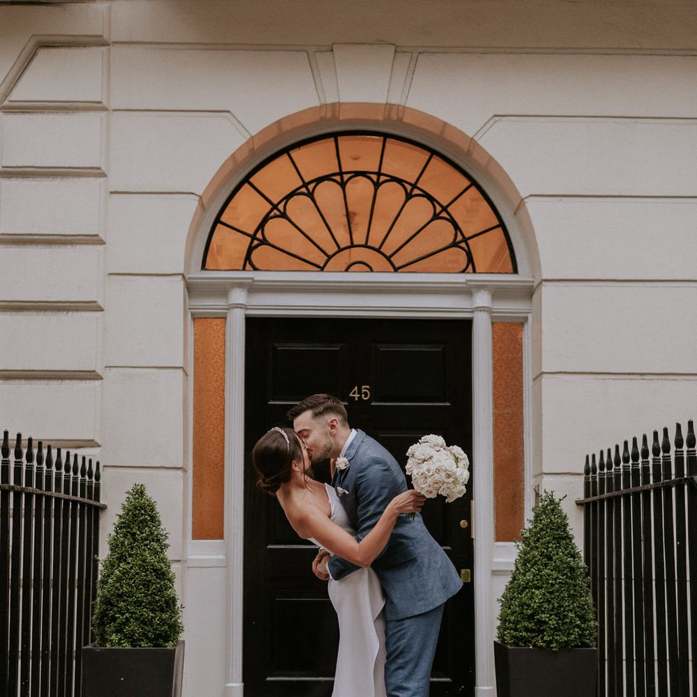 Bride and groom kissing at Old Marylebone Town Hall wedding 