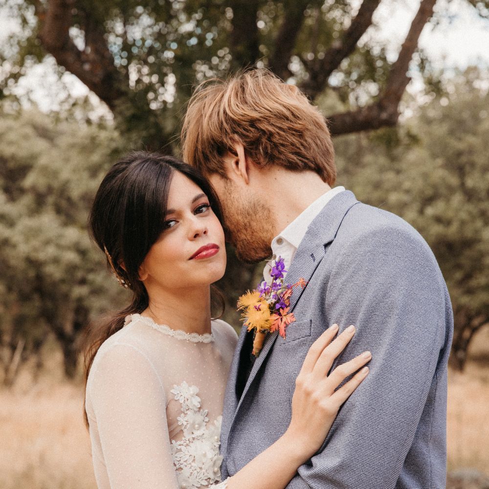 Bride & groom embrace during Spanish elopement 