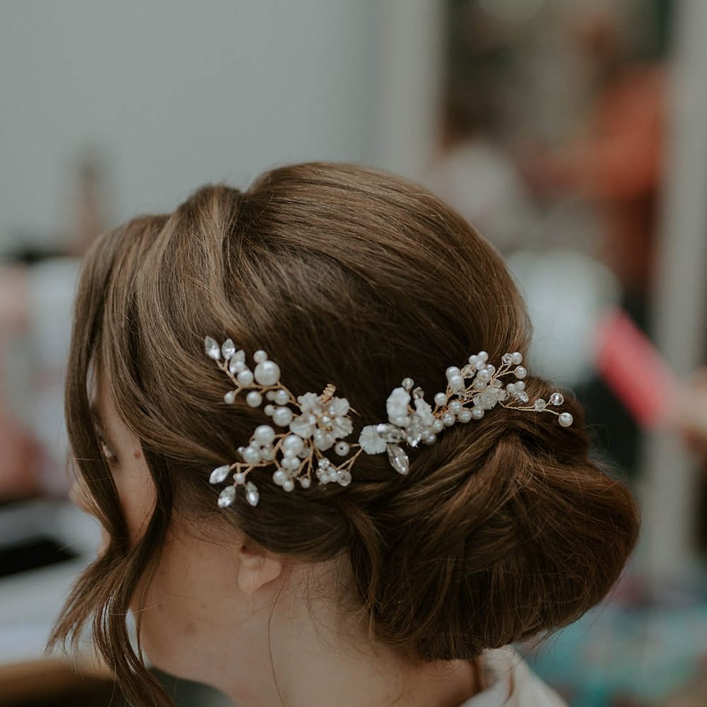 Embellished hairpiece with pinned updo 
