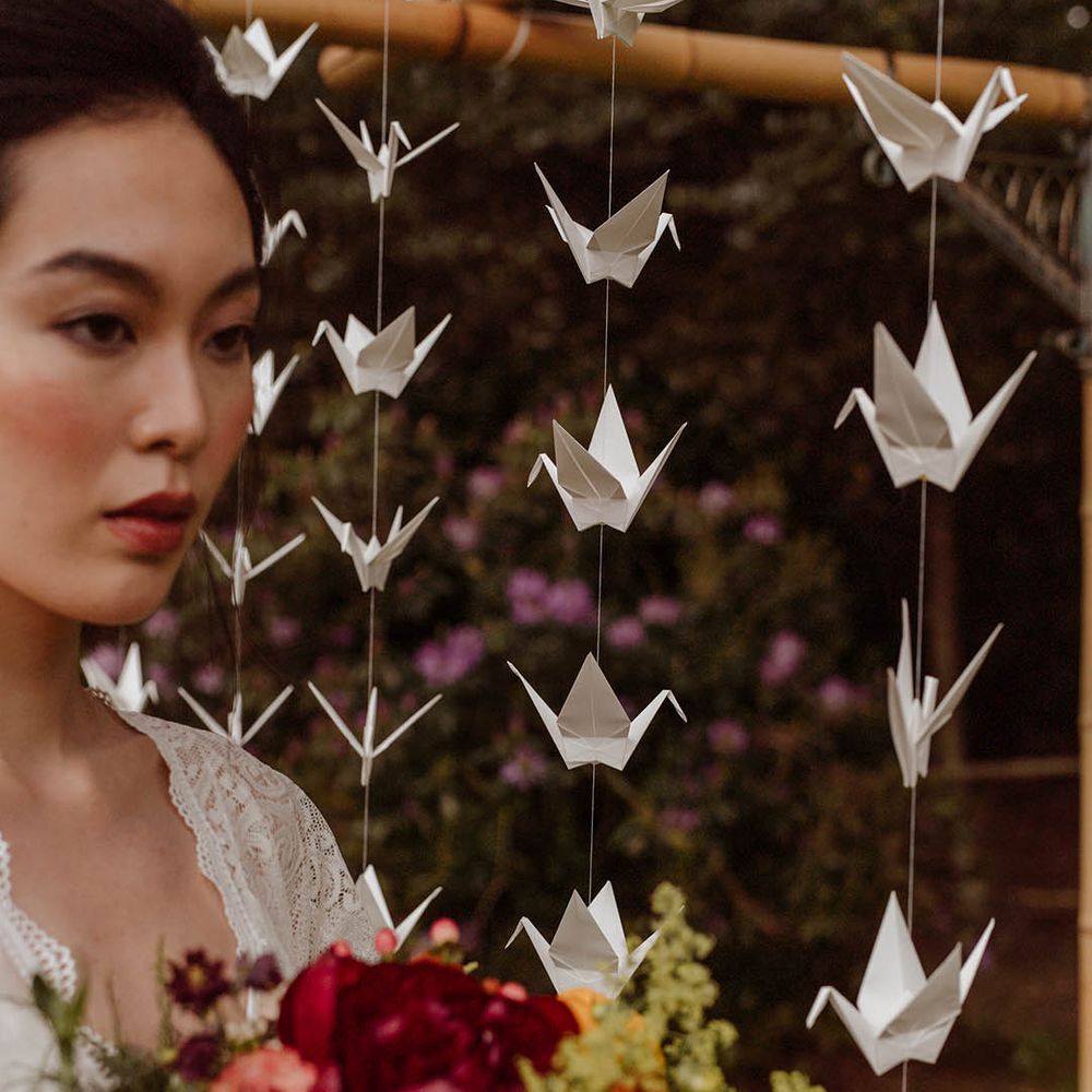 Japanese wedding inspiration with hanging paper cranes 