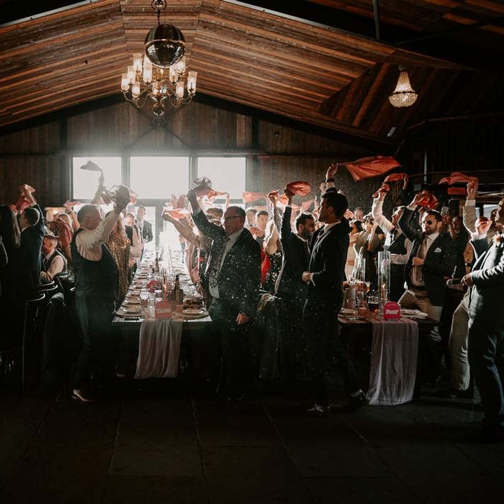 Willow Marsh Farm Loughborough wedding venue reception room with guests twirling napkins 