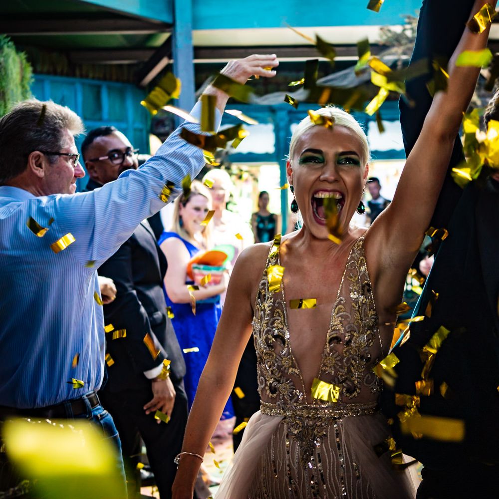 Confetti moment for bride and groom