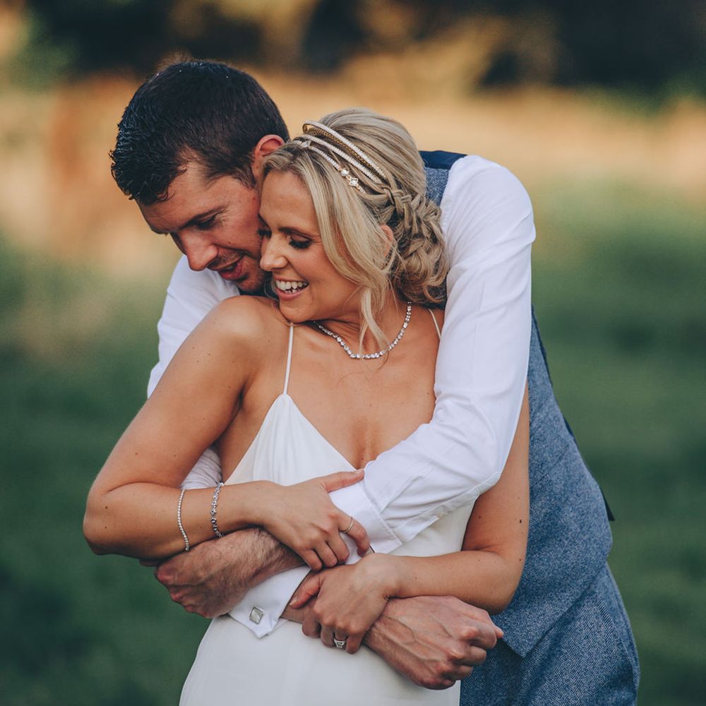 Bride in Victoria Percival hairband with braided updo