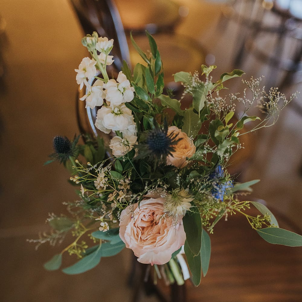 seasonal chair back wedding flower decor 