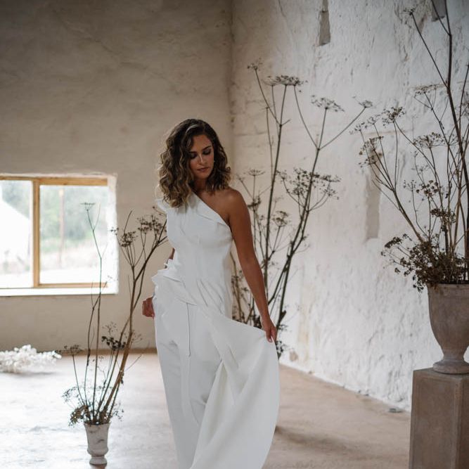 One should wedding jumpsuit at minimalist wedding 
