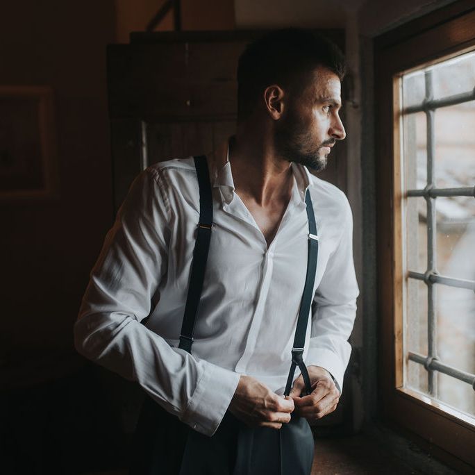 Groom getting ready on wedding morning