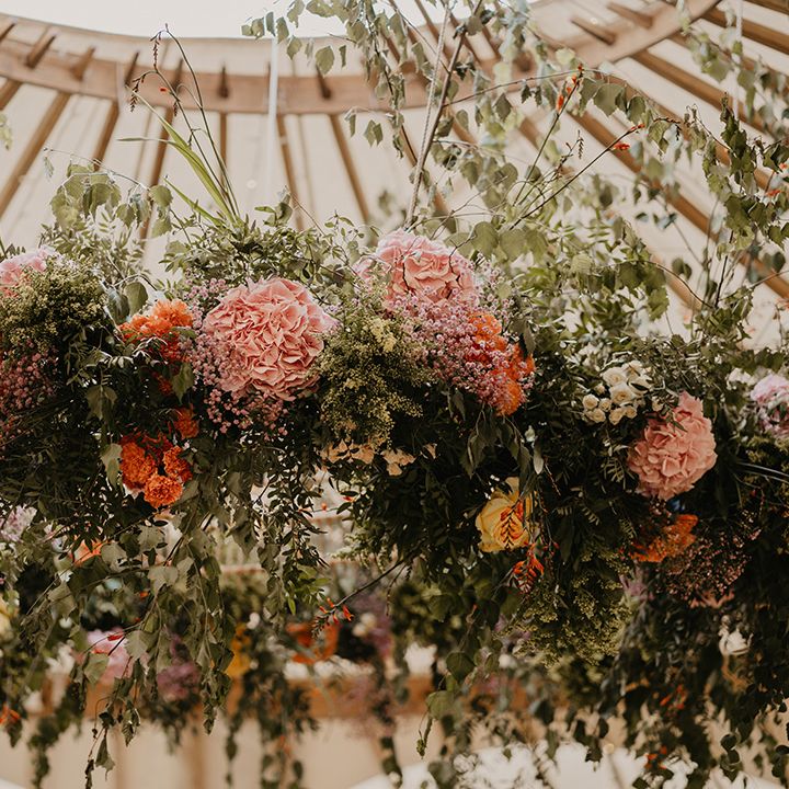 Gorgeous large floral display at wedding with colourful flowers