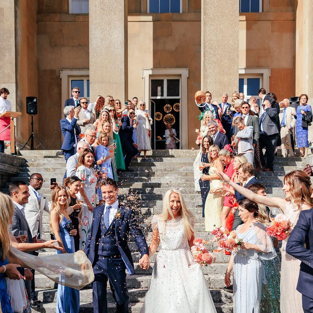 Confetti exit for the bride and groom at their wedding in Hampshire 