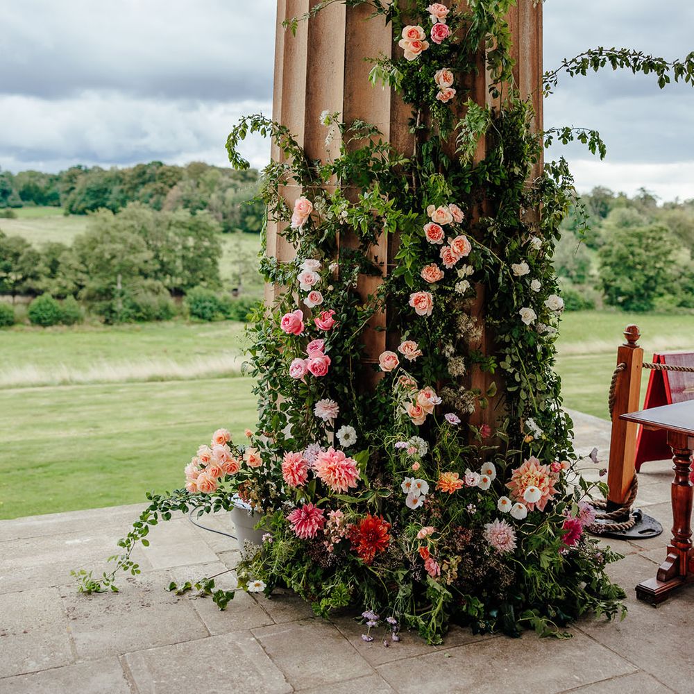 Pink wedding flower decorations decorating The Grange, Hampshire wedding venue 