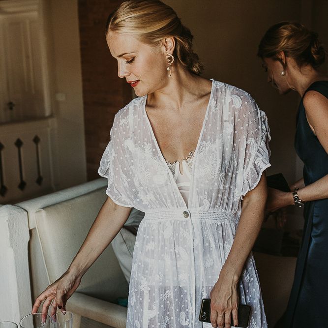 Bride in lace underwear and getting ready robes 