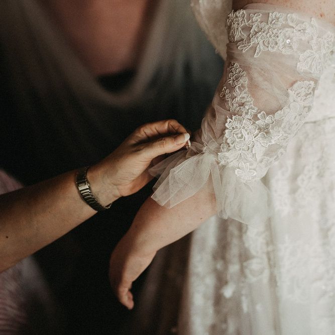 Lace sleeve details on Martina Liana designed dress