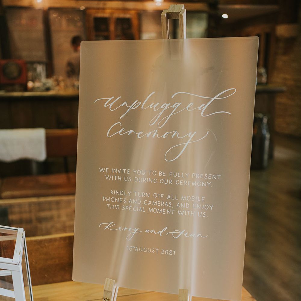 Frosted acrylic unplugged wedding ceremony sign 