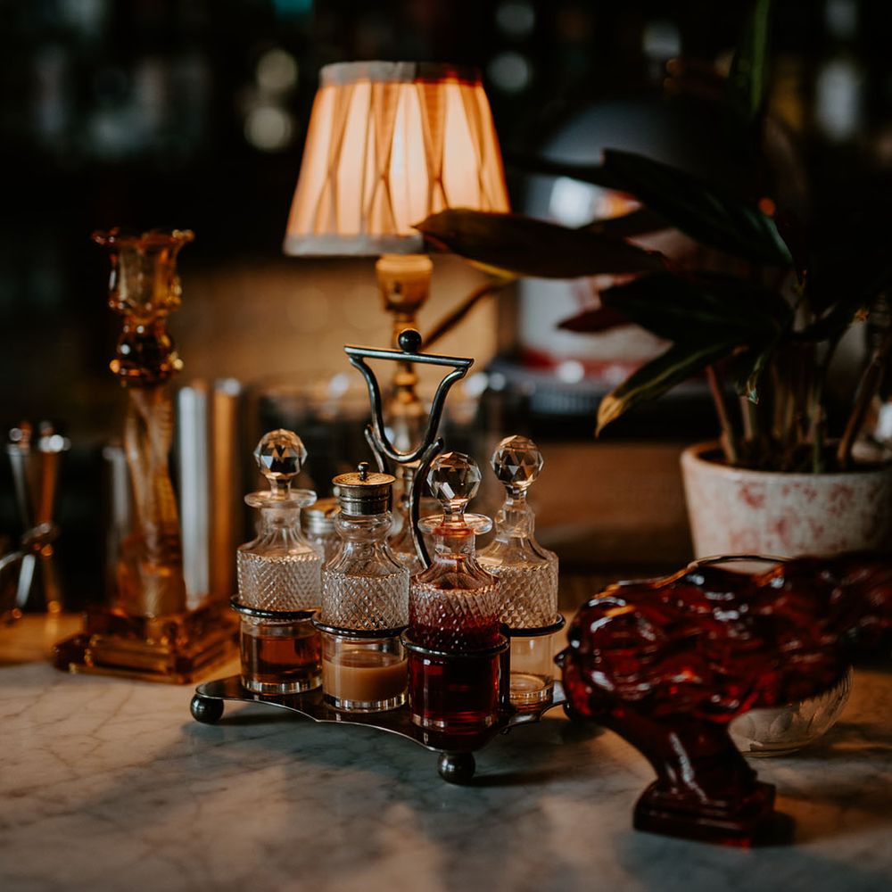 Industrial styled wedding reception with gold streamers decor 