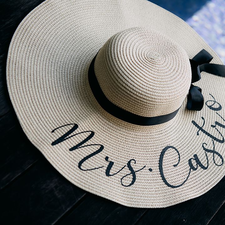 "Mrs. Castro" floppy straw embroidered sunhat with black ribbon 