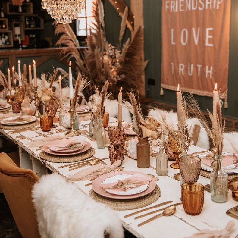 Boho tablescape with shag rug details on chairs