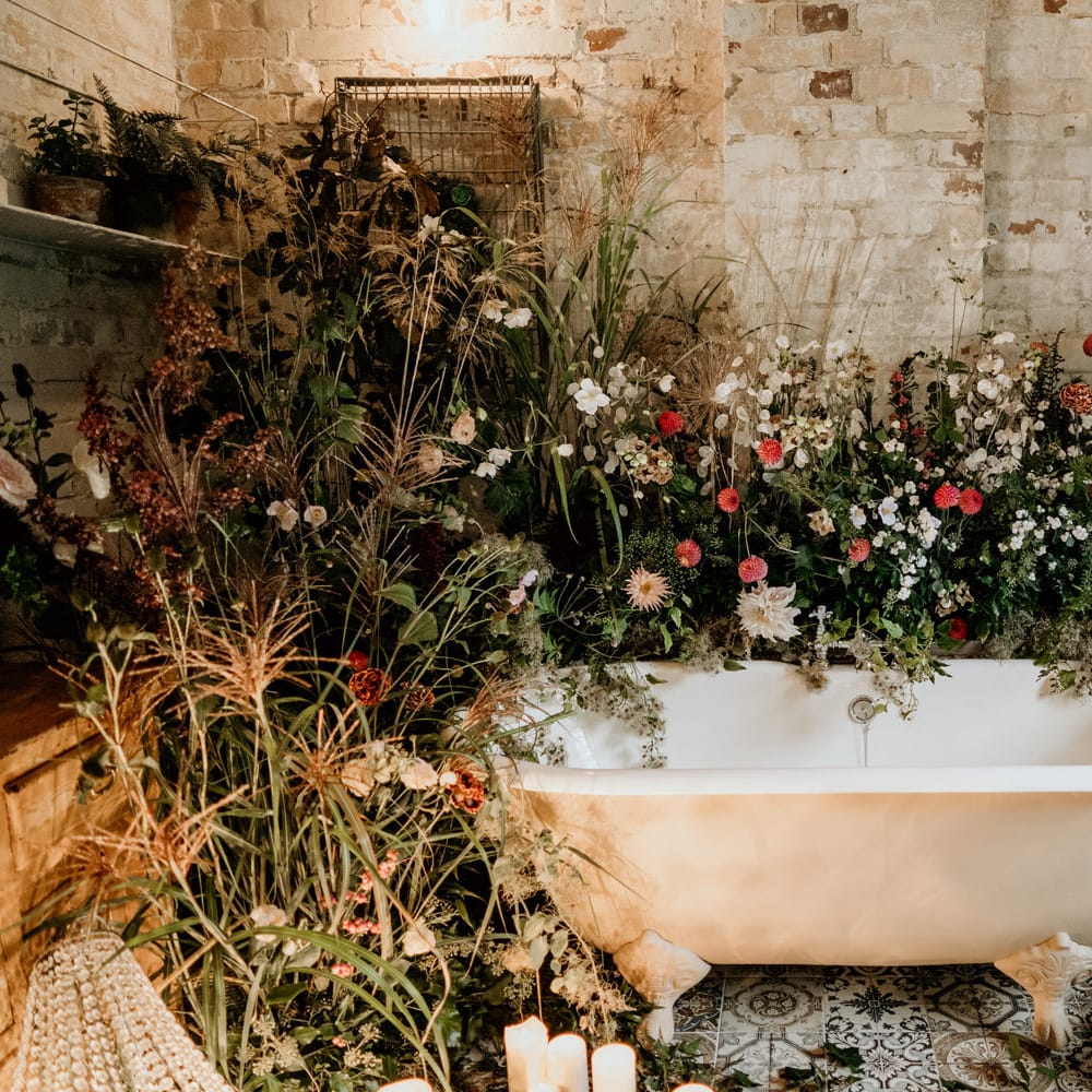 Roll Top bath surrounded by wildflowers 