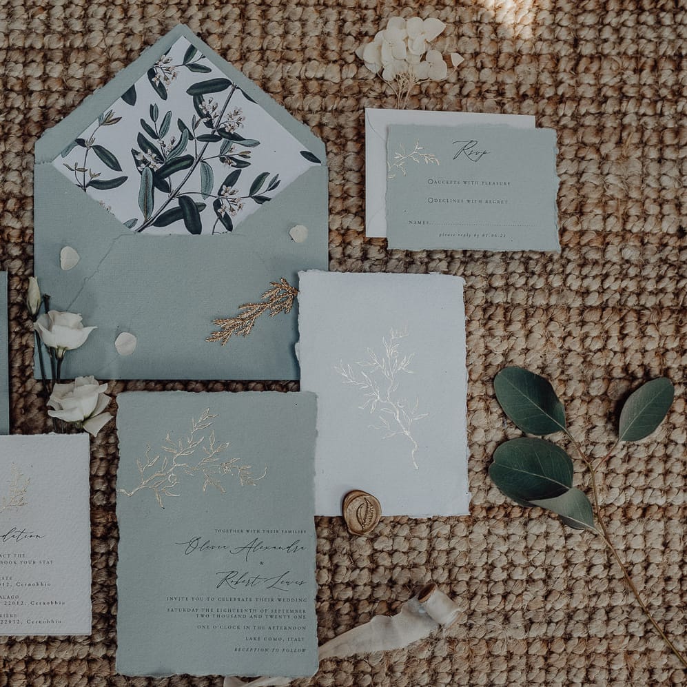 Duck egg blue and gold traditional wedding stationery suite with floral envelope liner 