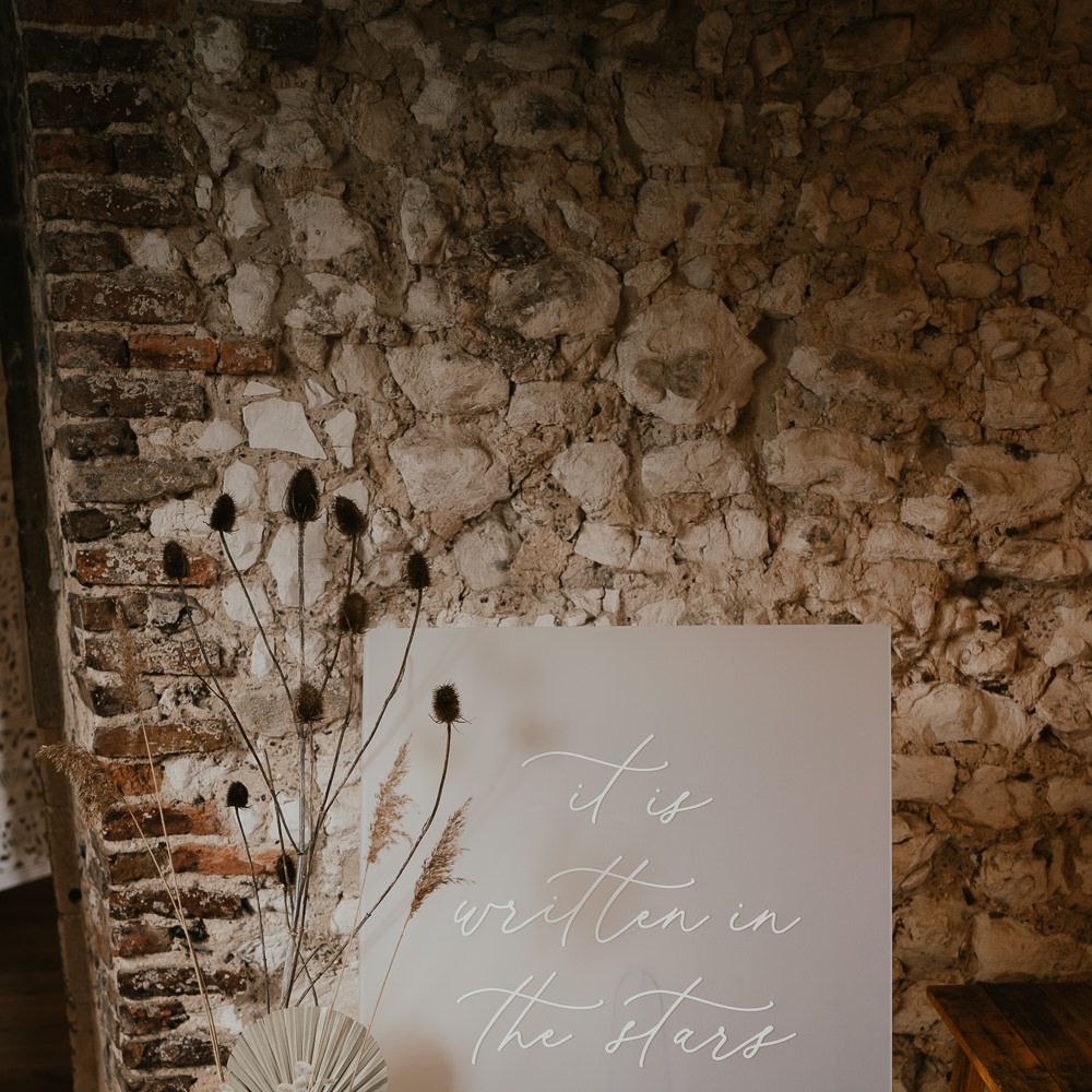 It is written in the stars etched acrylic wedding welcome sign 