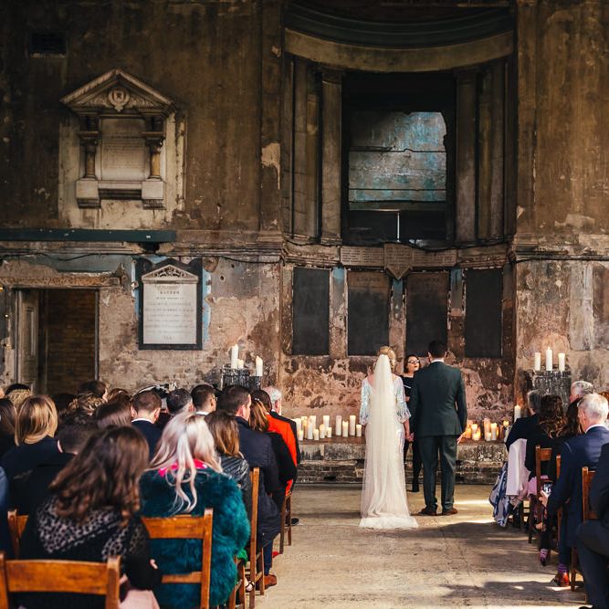 Bride & groom during wedding ceremony at The Asylum with industrial vibe