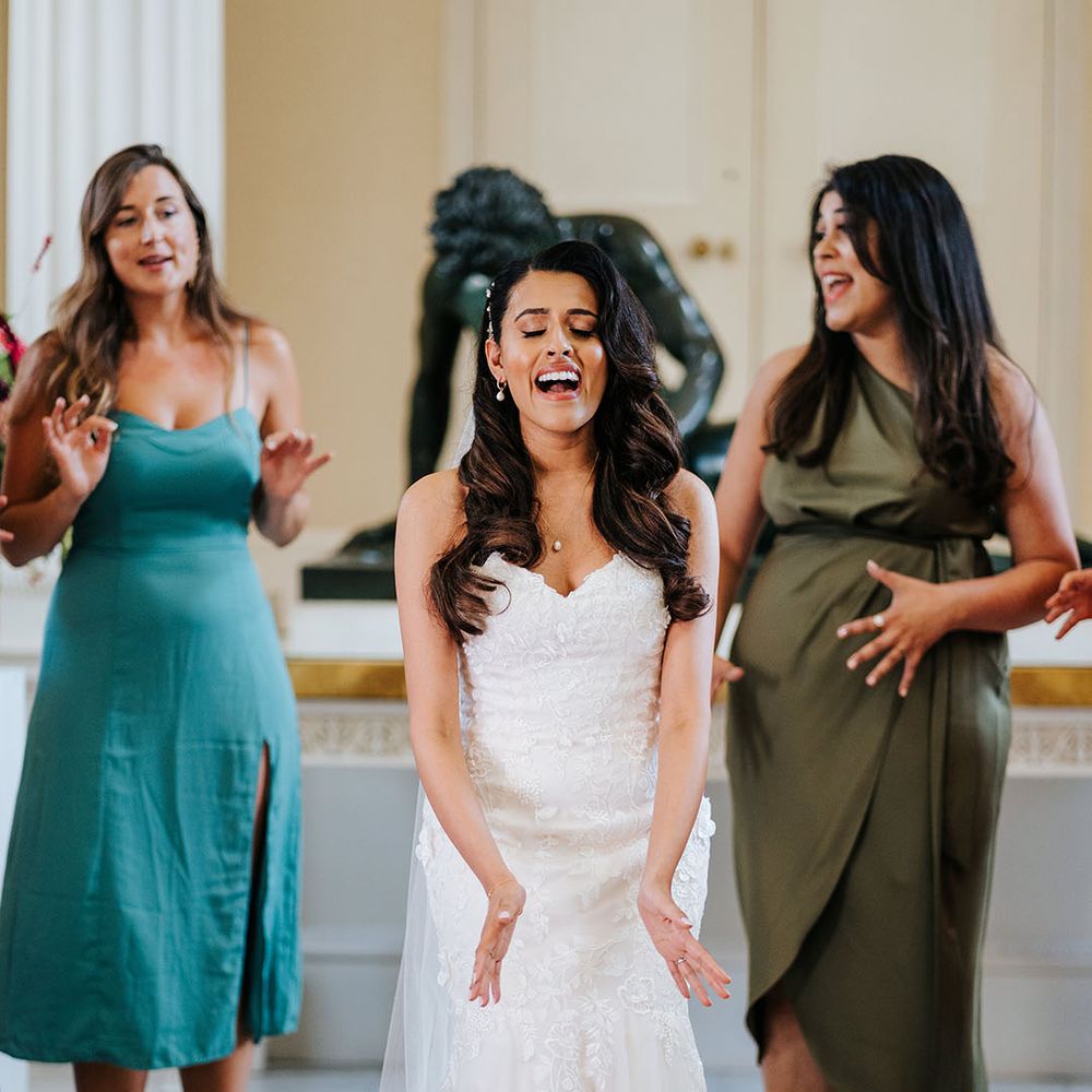 Bride sings with A Capella group after wedding ceremony at Syon Park