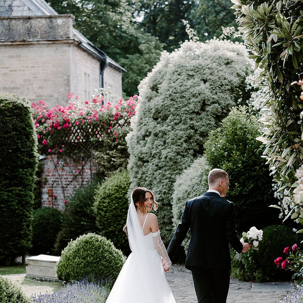 Black and white minimalist Babington House Soho House wedding with the bride and groom having their couple portraits 