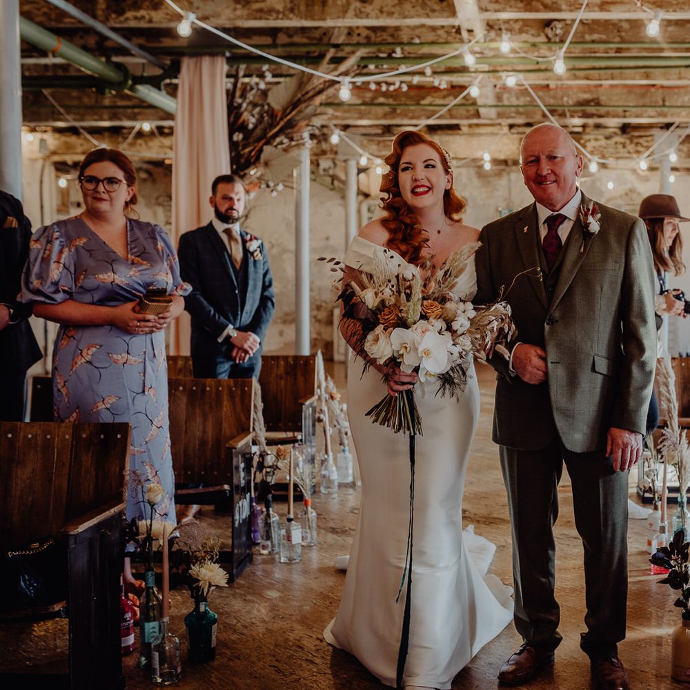 Father of the bride walking his daughter down the aisle at Holmes Mill 