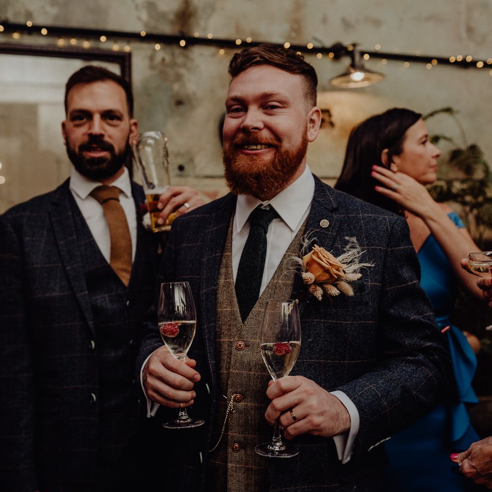 Groom in wool suit and waistcoat at vintage wedding 