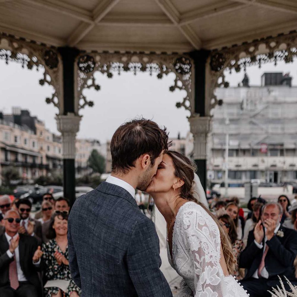 Brighton Bandstand wedding with dried grasses and lace wedding dress
