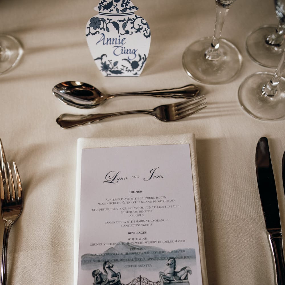 Place setting with blue and white Chinese Pottery place name cards 