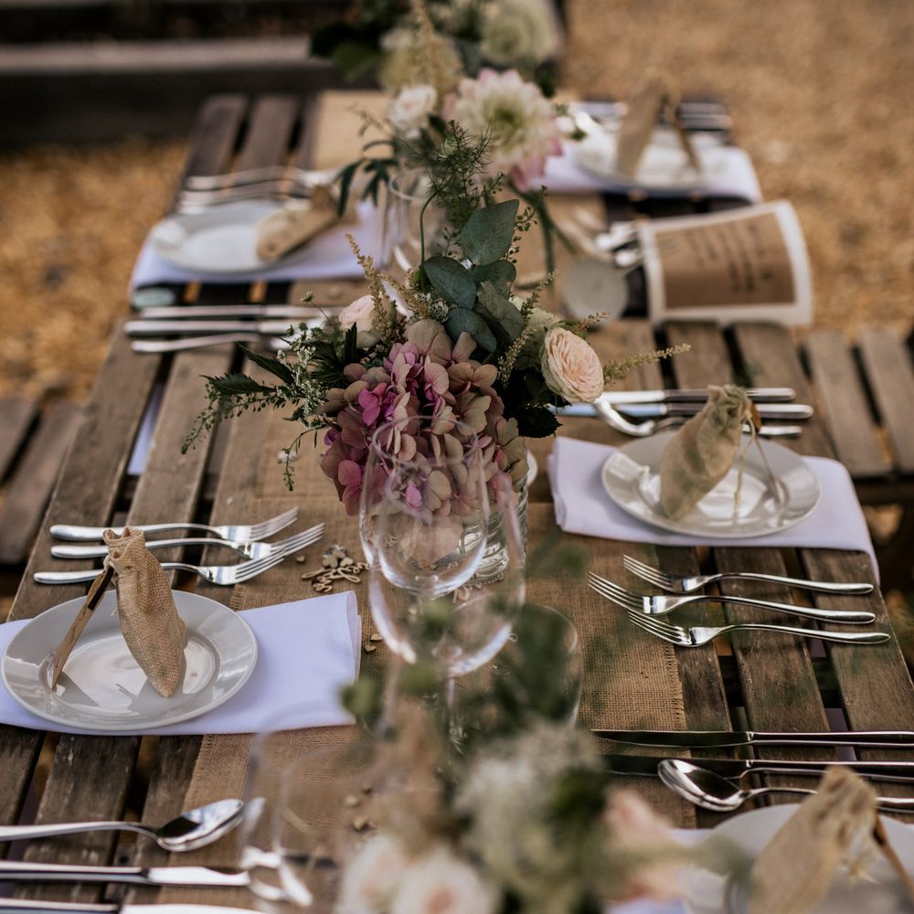 Rustic table decoration for outdoor wedding