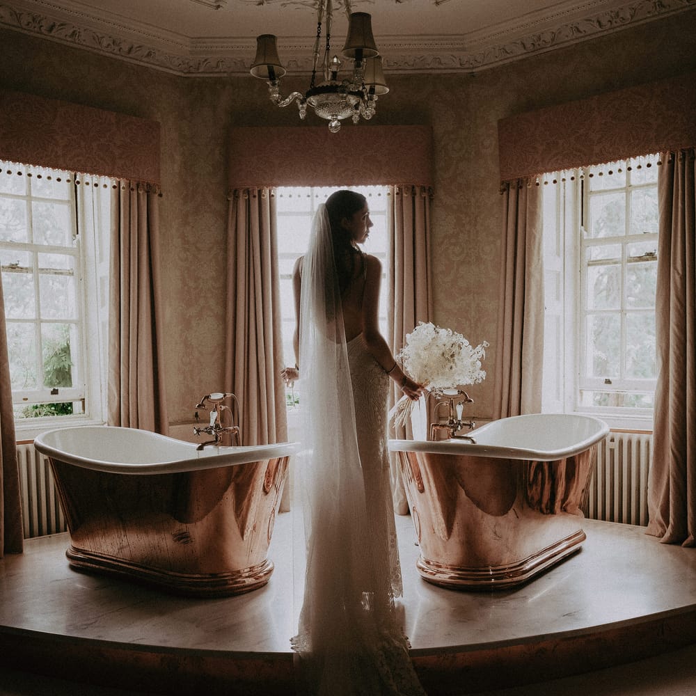 Bride with white bouquet and veil
