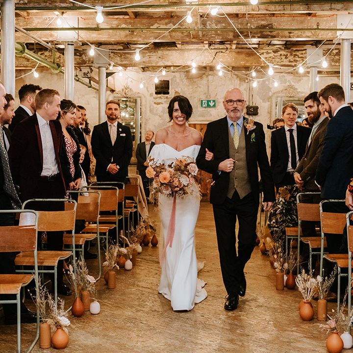 Father of the bride walks bride down the aisle at industrial wedding venue, Holmes Mill 