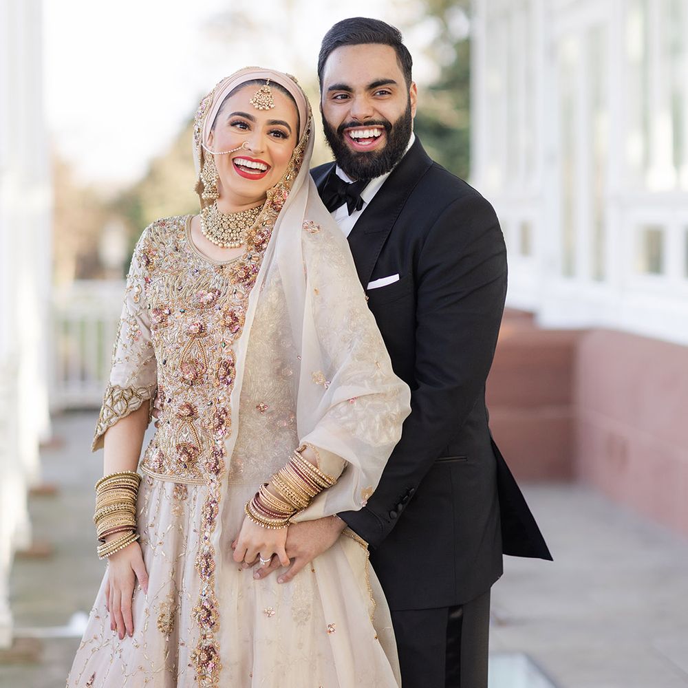 Bride & groom smile brightly after Walima & Nikkah ceremony at the Isla Gladstone Conservatory