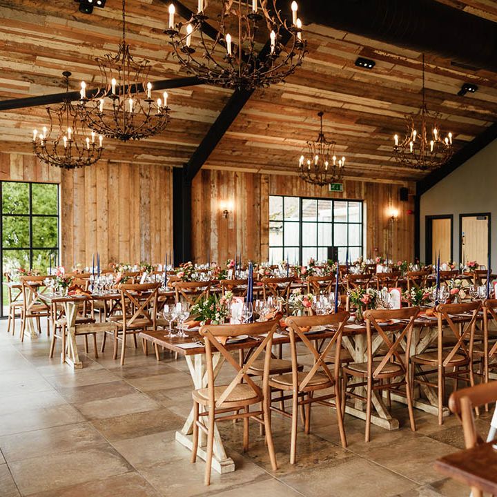 Botley Hill Barn autumn wedding in Surrey with blue and orange theme styling 