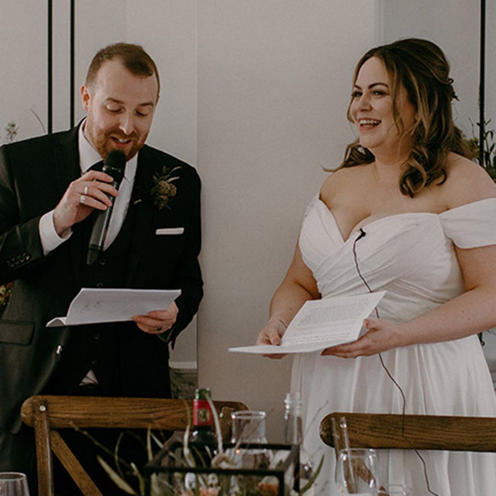 Aswarby Rectory wedding with the bride and groom standing up at their wedding reception for their joint wedding speech 
