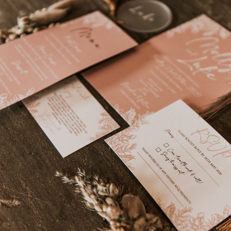 Blush pink and white wedding stationary details