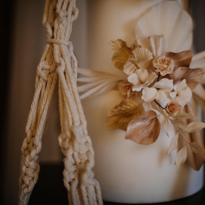 Hanging macrame wedding cake for rustic barn wedding