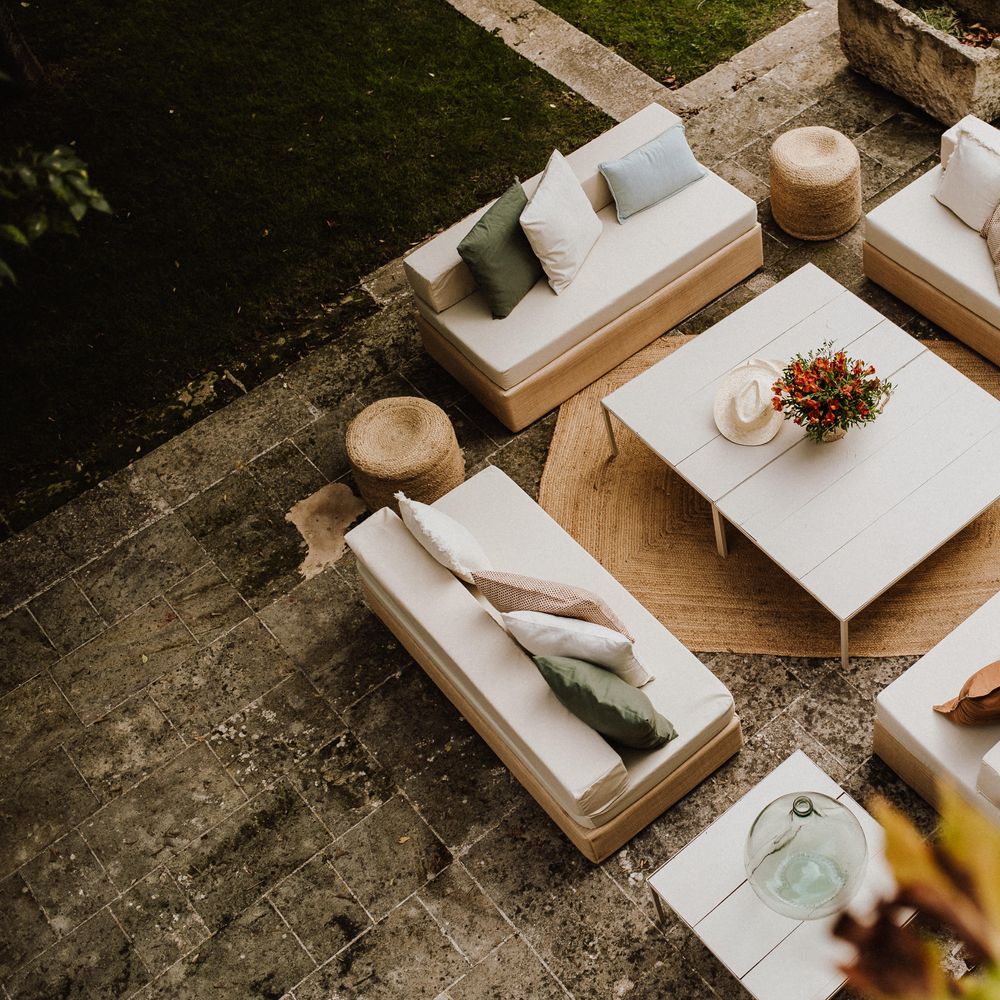 Birdseye view of outdoor table and sofas
