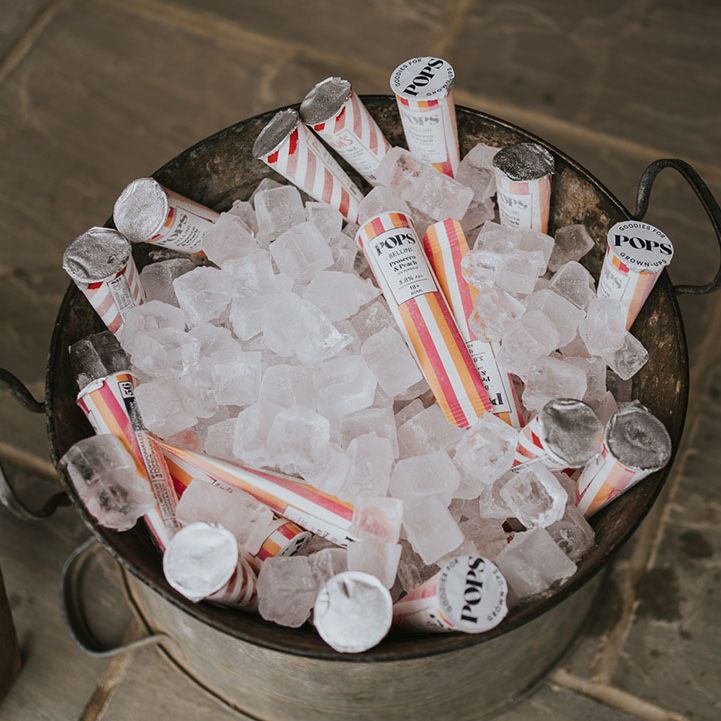Vintage ice bucket with ice pops for wedding guests 